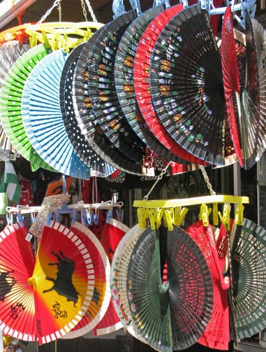In the market, fans on display.